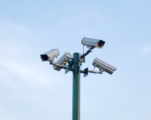 Cctv,On,Green,Pillars,To,Secure,The,Background,Is,A Cctv,On,Green,Pillars,To,Secure,The,Background,Is,A